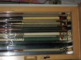 Meucci display case with cues