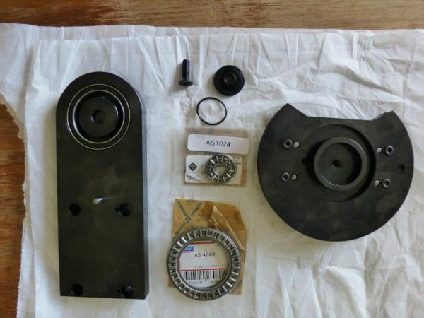 Pic-10 40X52x7 bearing installed in Top plate.
C' sink screw with nylon locking cross drilled and inserted.
