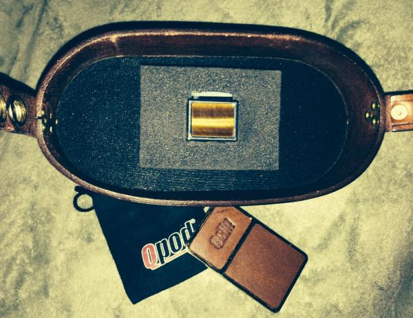 QPOD holder in case lid.