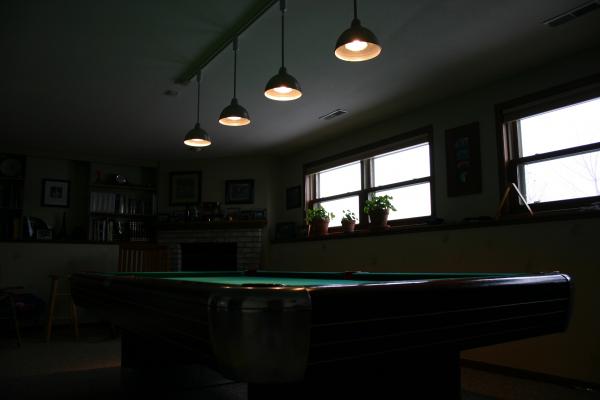 Retro can lighting.  I installed a remote control dimmable switch to mate with the halogen bulb based track lighting system.  Next step is to replace 