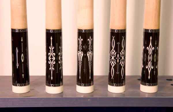 Second, third, and fifth from the left I designed for Joe Gold. Joe added all silver embellishments and minor tweaks.