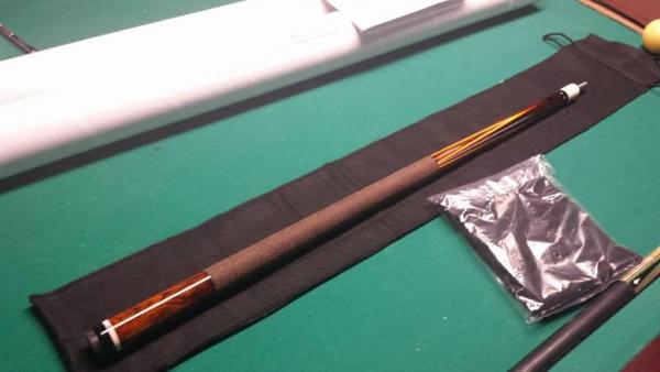 SLY complete cue on table