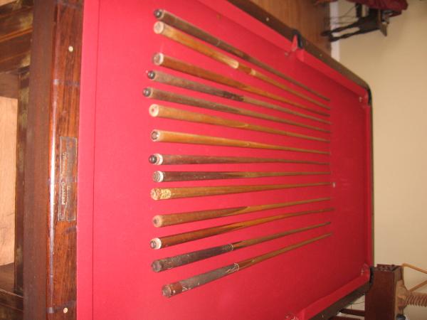 Some of my grandfathers cues...  They're not for sale but someday I might have one of the butterflies made into a player.