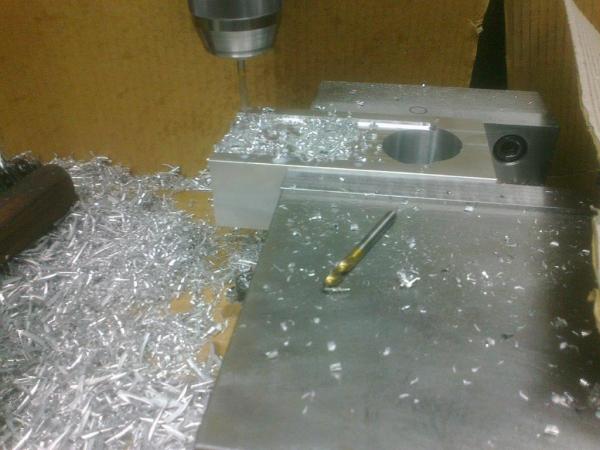 Spot drill and drilling the capscrew holes. Drilled from under side, as that is the important side to match Taig Slide T slot.