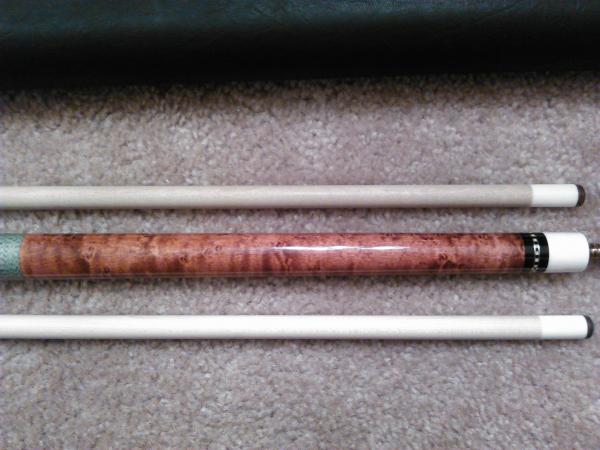 stained birdseye maple forearm.  really nice figure