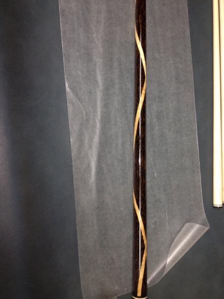 The only photo I have of the hardest cue I ever built.  This was all black palm, and spiraling 2.5 revolutions across the entire butt section is 2 pie