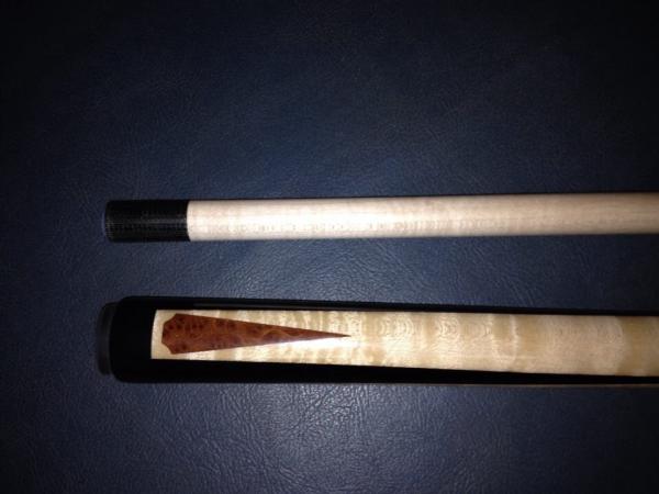 This is a jump cue I made to match a shooter for Ryan Sauer.  Birdseye Maple with ebony points, and smaller redwood burl points.  Another cue that jum