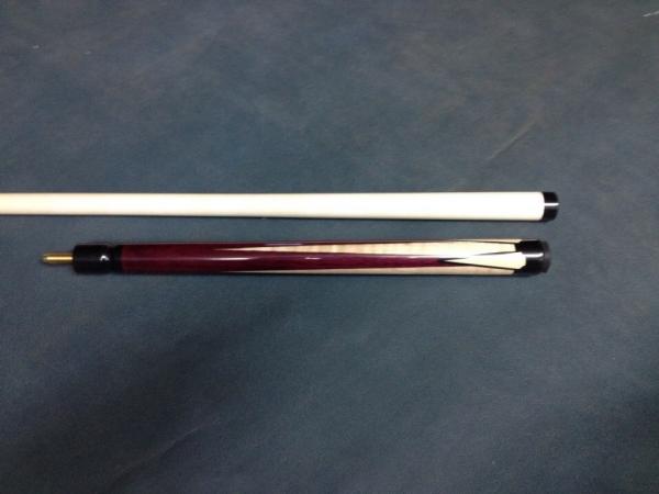 This was a jump cue made to match a cue I made for Chris Giarde.  This is purpleheart, with curly maple points, and faux ivory points with a single bl