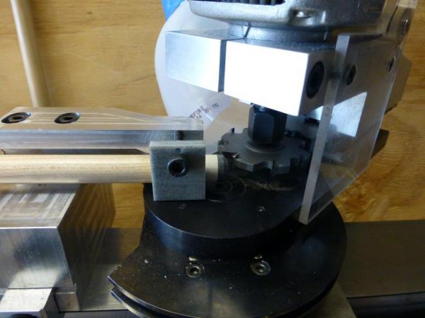 Turcite Vee support for tip trimmer