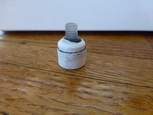 Using plumbers tape to keep the glue off the tip side walls and poly-carb tip holder taper.